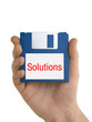 Solutions disc in hand Solutions disc in hand
