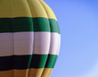 Yellow, green, white hot air balloon