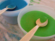 green sand in a plastic container