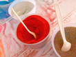 Red and multicolored sand at the fair