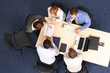 business woman making presentation to group of people business woman making presentation to group of people