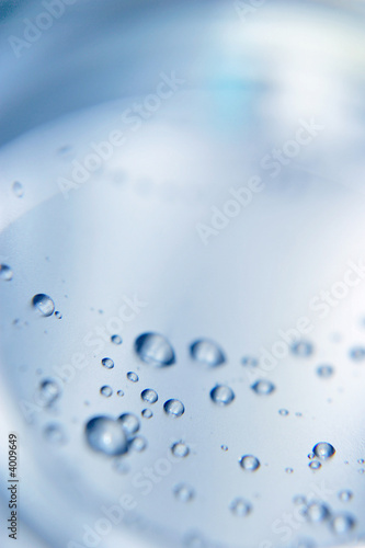 Macro shot of water drops in a bottle Macro shot of water drops in a bottle