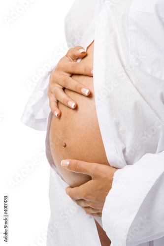 Photo: pregnant woman holding her belly pregnant woman holding her belly