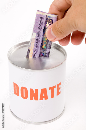 Photo: canadian dollar and Donation Box canadian dollar and Donation Box