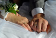 bride and groom hands