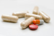 Photo: pills over white pills over white