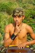 Photo: Hushing jungle terrorist with laptop PC Hushing jungle terrorist with laptop PC
