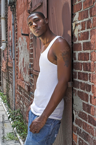 Photo: hip-hop guy in alley hip-hop guy in alley