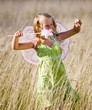 Little girl with butterfly wings