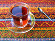 Turkish tea, served on traditional turkish tablecloth Turkish tea, served on traditional turkish tablecloth