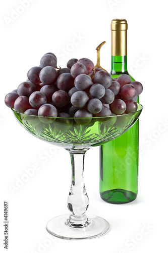 Grapes and bottle