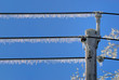 Icicles hanging from power lines after an ice storm Icicles hanging from power lines after an ice storm