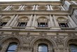 arched windows with columns and sculptures arched windows with columns and sculptures