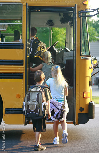 Kids Getting on School Bus
