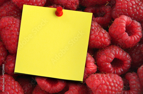 raspberries and yellow note