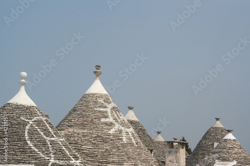 Alberobello Trulli con simboli Alberobello Trulli con simboli