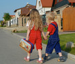 Two children walking on the street Two children walking on the street