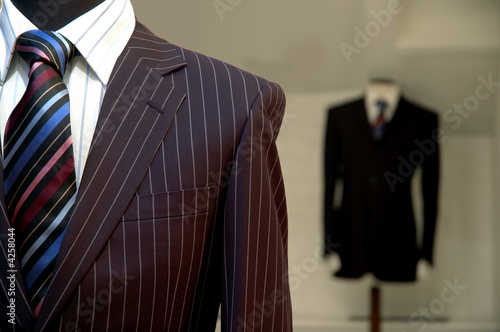 Photo: Suits on shop mannequins Suits on shop mannequins