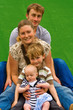Family Sitting Outside