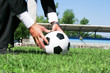 Photo: BUSINESS MAN PLAYING FOOTBALL BUSINESS MAN PLAYING FOOTBALL