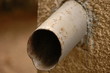 Water pipe in a stone wall Water pipe in a stone wall