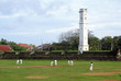 Green field near clock tower