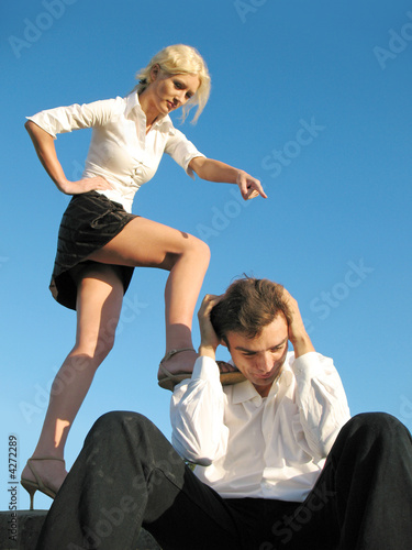 Photo: lady boss and subordinate man / from photobank.kiev.ua lady boss and subordinate man / from photobank.kiev.ua