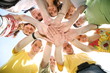 team with joined hands