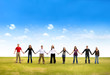 Foto: Friends holding hands outdoors Friends holding hands outdoors