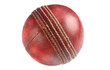 An old used red cricket ball, isolated on a white background.
