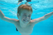 Boy swimming underwater Boy swimming underwater