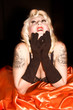 Blonde Woman with Black Gloves