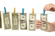 Hands and dollars
