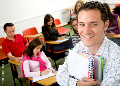 Photo: casual student or teacher in a classroom casual student or teacher in a classroom