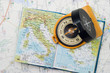 Compass on a small atlas Compass on a small atlas