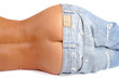 Tanned woman's torso in ragged jeans taken down slightly
