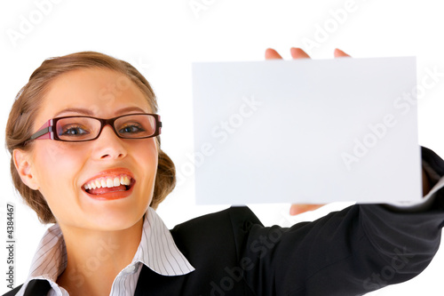 Beautiful businesswoman holding a notecard