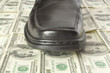 Shoe on dollar floor