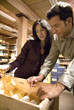 Couple shopping for wine