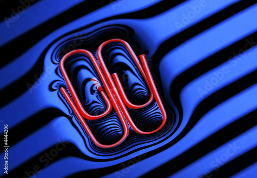 Paper clip floating on water Paper clip floating on water