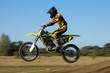 Yellow motocross flying