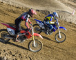 Photo: Two riders in a race Two riders in a race