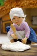 Woman Making Cotton