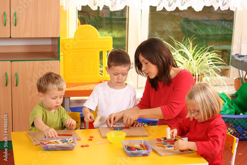 Photo: preschoolers and wooden blocks preschoolers and wooden blocks