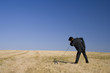 a businessman taking a call from Earth