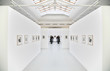 people on the exhibition of the photographs