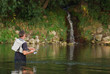  Fisherman angling on the river