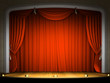 Empty stage with red curtain in expectation of performance Empty stage with red curtain in expectation of performance