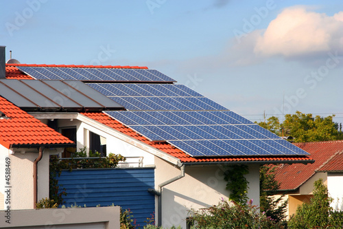 Photo: House with solar panels on the roof House with solar panels on the roof