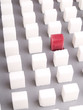 unique cube surrounded in bright ones